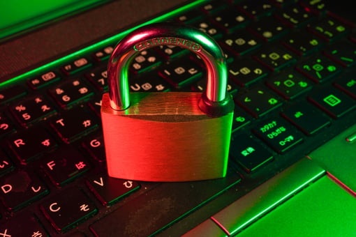 ATSI Houston Cyber Security Fails Lock Above Keyboard Glowing in Red and Green